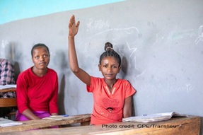 Girl puts her hand up in rural classroom, Ethiopia