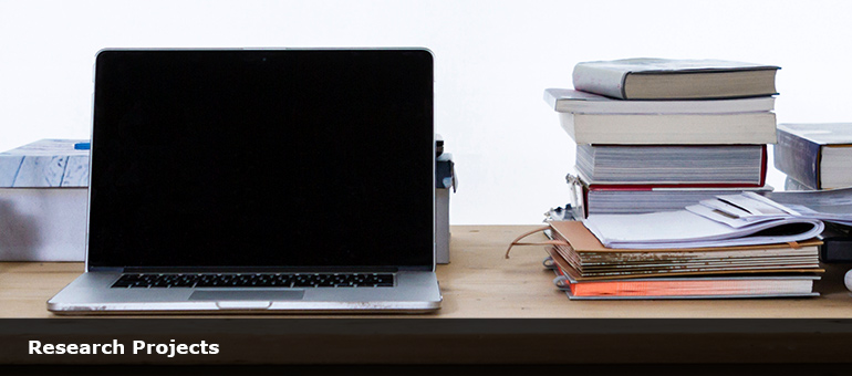 Laptop and books. Photo by&nbsp;freddie marriage&nbsp;on&nbsp;Unsplash. Copyright free.