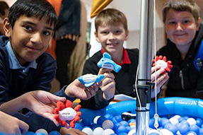 Read more about MEITS A group of school boys showing things they have made