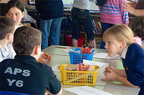 Read more about T-SEDA A group of primary school children working together at a table